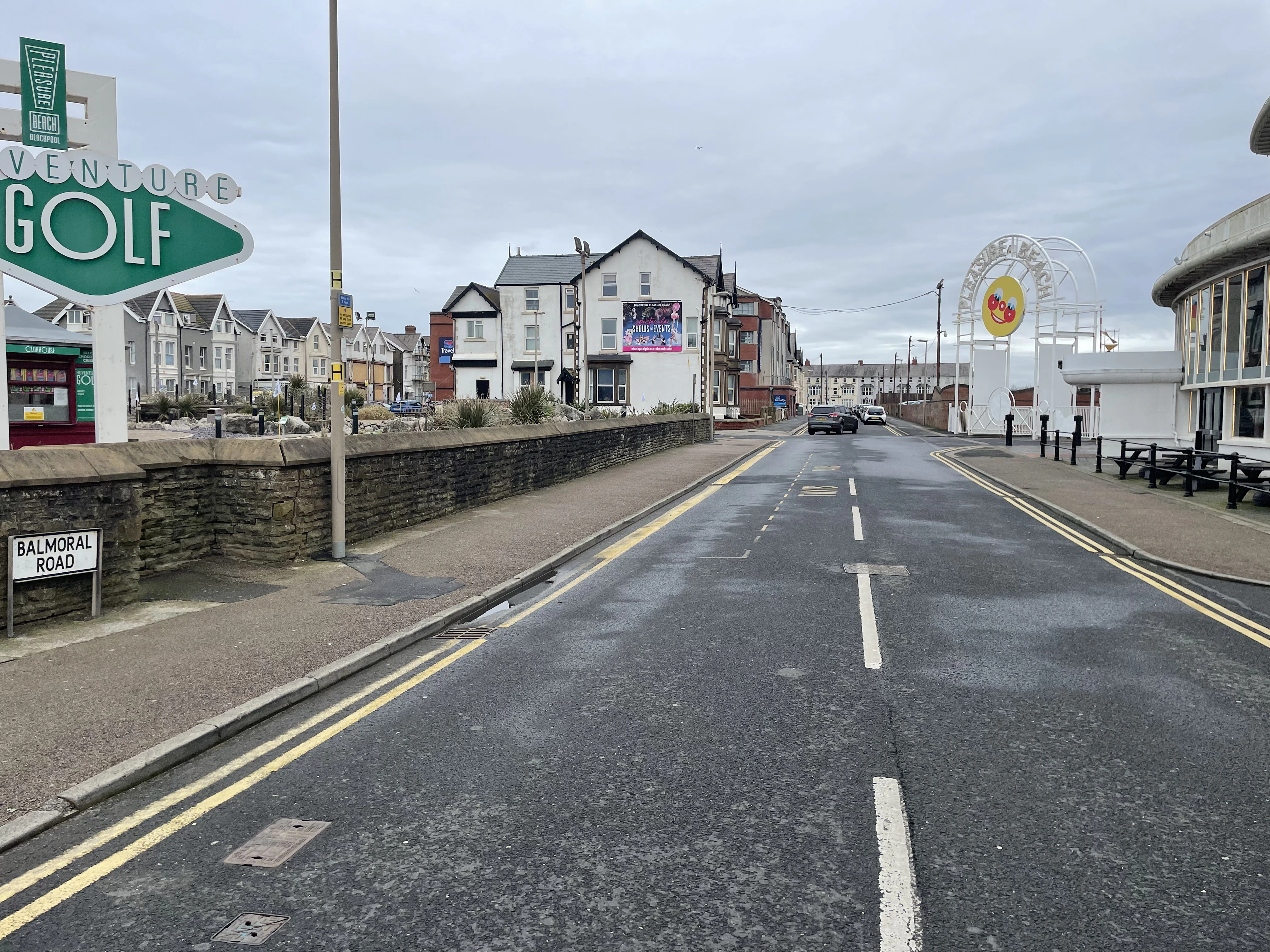 View of Blackpool Pleasure Beach's entrance from the bottom of Balmoral Road, Adventure Golf is on the left