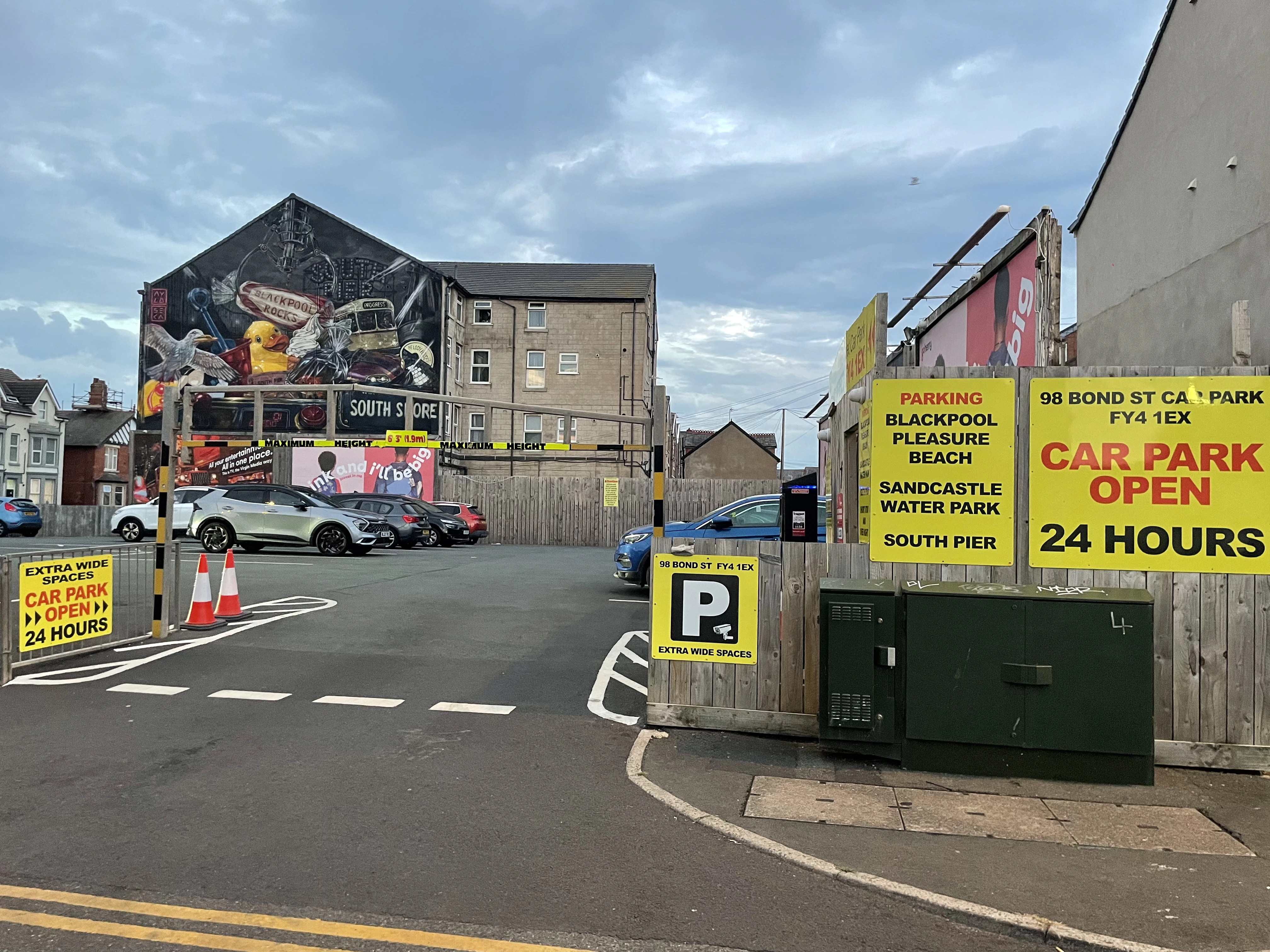Entrance to 98 Bond Street Car Park with height barrier and 24-hour signage